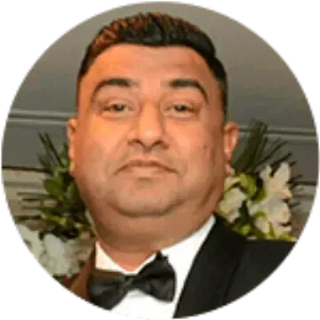 Official portrait of Mr. Muzammal Ahmed